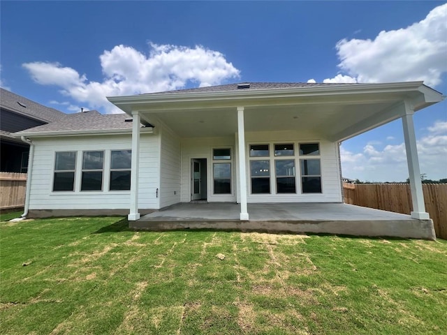 20425 Gillbrand Rd, Manor, TX 78653 - rear view of house with a patio area
