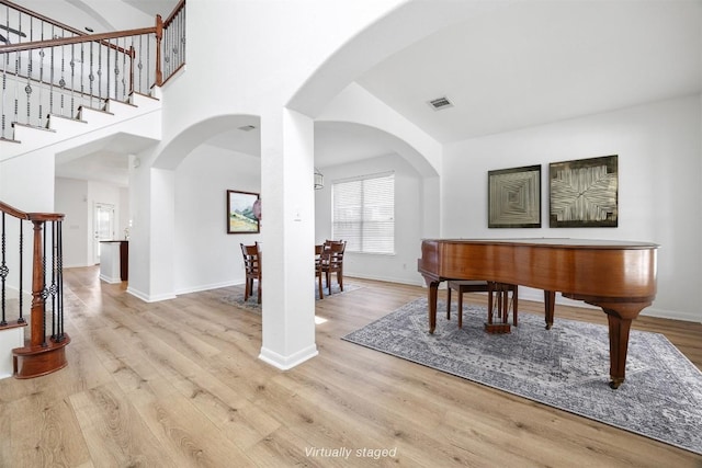 2246 Garlic Creek Dr, Buda, TX 78610 - office space featuring arched walkways and wood finished floors