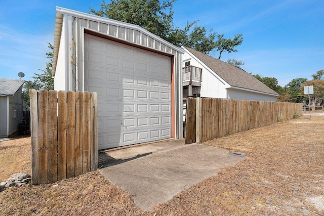 garage featuring fence