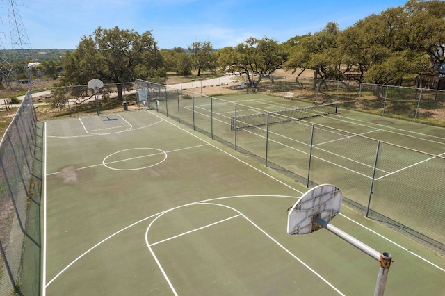 view of sport court with community basketball court and fence