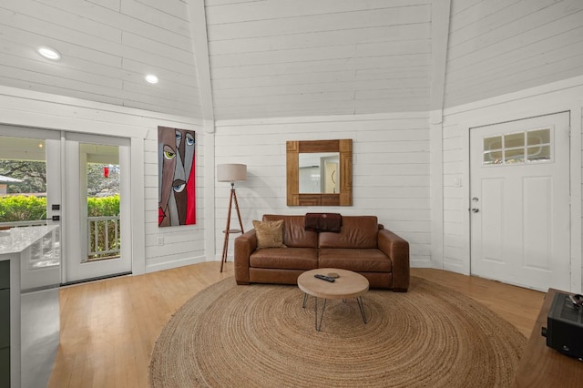 living room with recessed lighting and wood finished floors