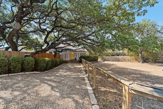 view of front of house featuring a fenced front yard