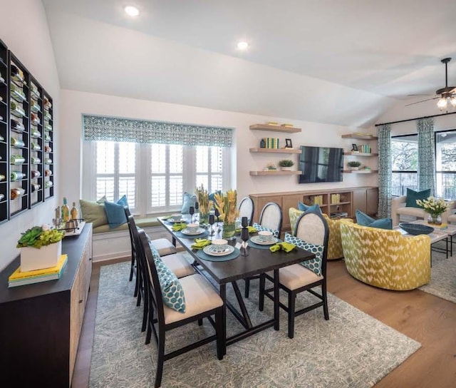 dining area with recessed lighting, wood finished floors, a ceiling fan, and vaulted ceiling