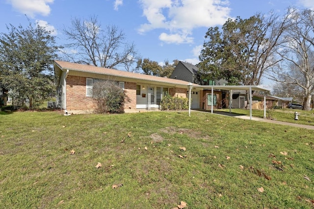 single story home featuring driveway, a front lawn, a carport, a garage, and brick siding