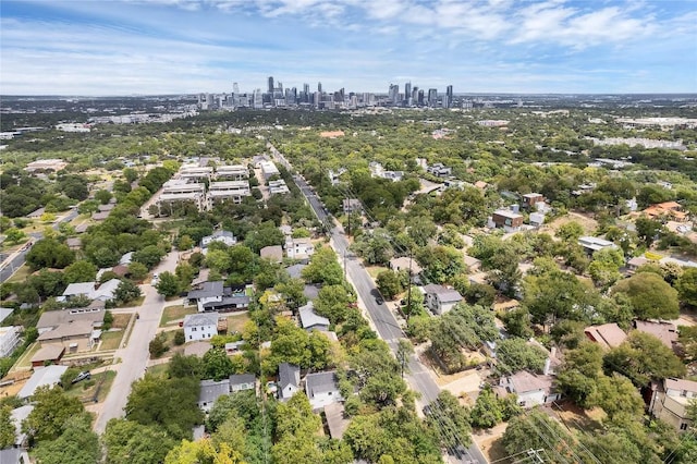 birds eye view of property with a city view