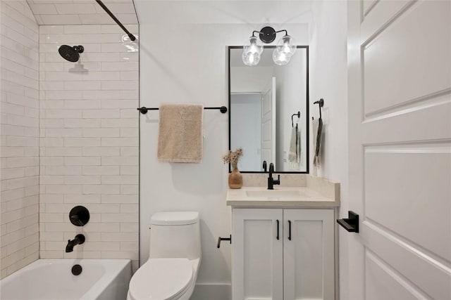 bathroom with tub / shower combination, toilet, and vanity