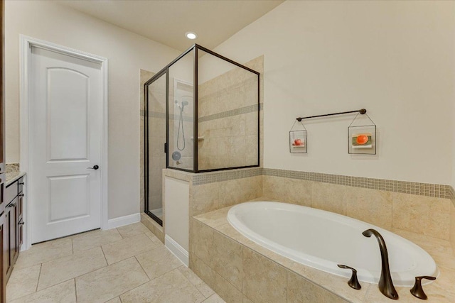 full bathroom with a bath, tile patterned flooring, recessed lighting, and a stall shower