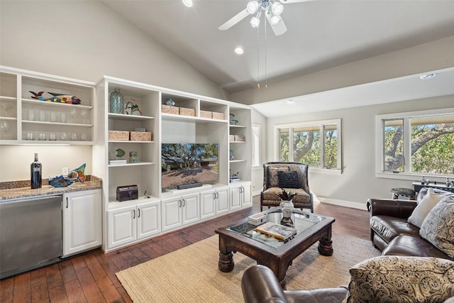 living area featuring recessed lighting, a ceiling fan, dark wood-type flooring, and lofted ceiling