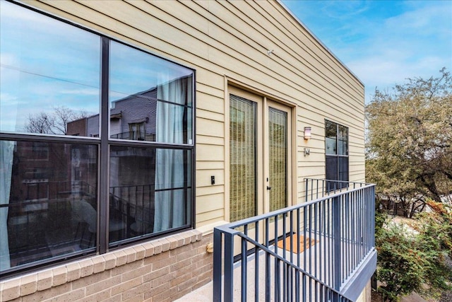 doorway to property featuring a balcony