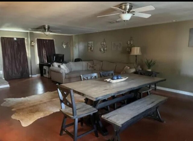 616 S Rockdale St, Lexington, TX 78947 - dining area with wood finished floors, baseboards, and ceiling fan