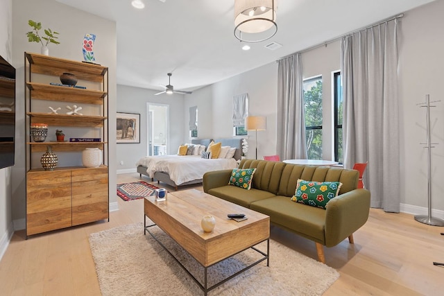 714 Crystal Creek Dr, Austin, TX 78746 - bedroom with light wood-style flooring and recessed lighting