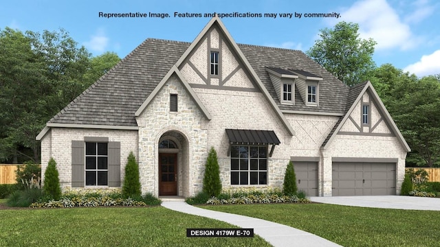 view of front facade with brick siding, concrete driveway, and a front yard