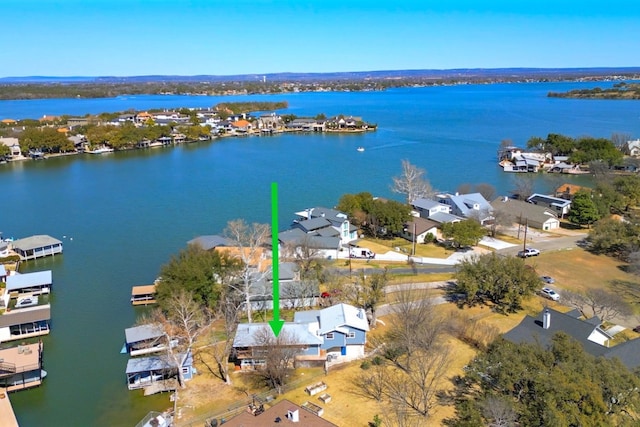 aerial view featuring a water view and a residential view