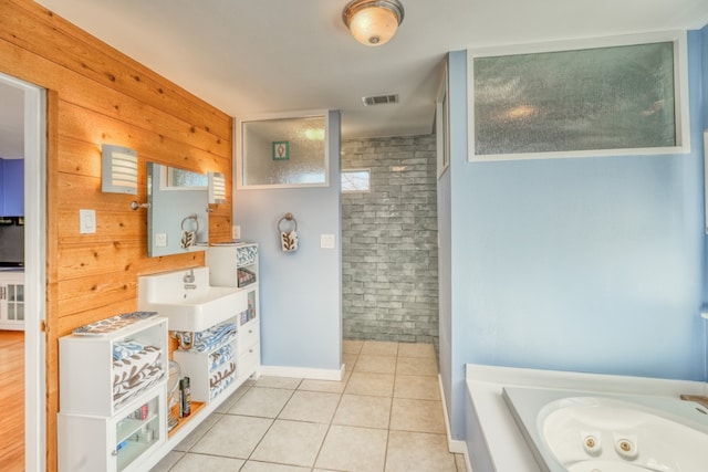 331 Grandview Dr, Horseshoe Bay, TX 78657 - bathroom with tile patterned flooring, baseboards, a tub with jets, vanity, and a shower