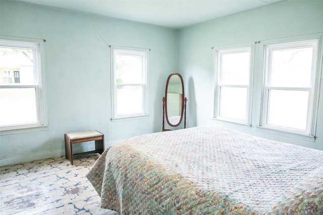 bedroom with multiple windows