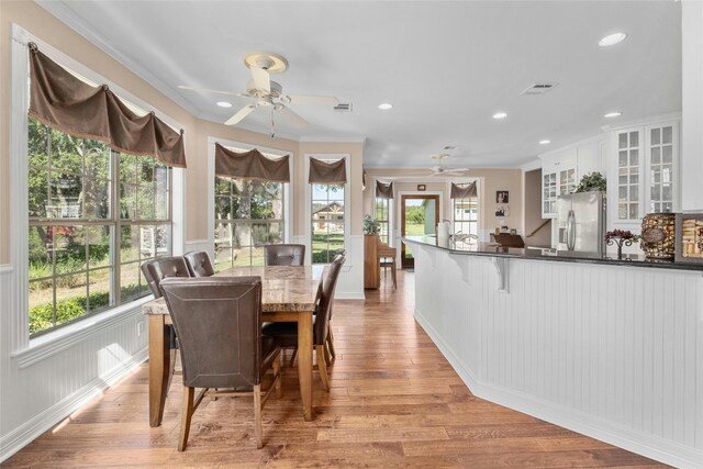 dining area featuring visible vents, recessed lighting, and light wood-style floors