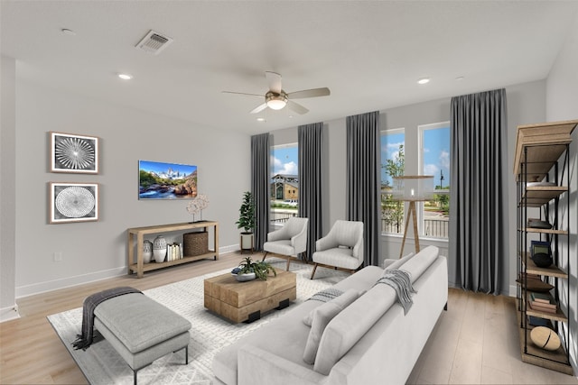 503 Emory Crossing Blvd, Hutto, TX 78634 - living area with a ceiling fan, light wood-style floors, baseboards, and recessed lighting