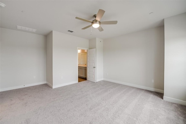 503 Emory Crossing Blvd, Hutto, TX 78634 - unfurnished bedroom with light colored carpet and baseboards