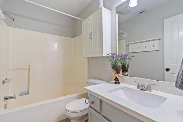 full bathroom with visible vents, vanity, toilet, and bathing tub / shower combination