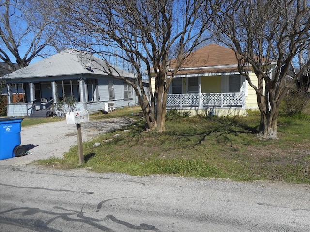 view of front of home featuring covered porch