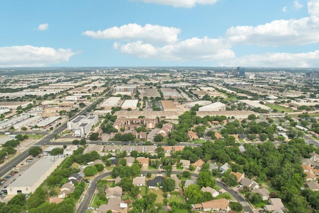 birds eye view of property with a residential view