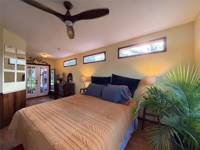 bedroom featuring a ceiling fan, access to outside, and french doors