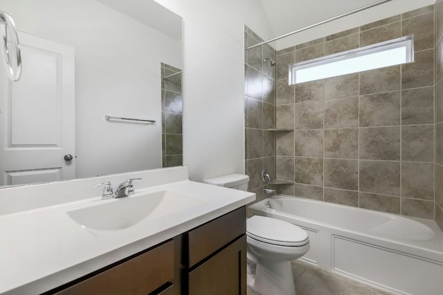 bathroom with vanity, toilet, and  shower combination