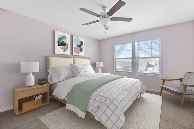 bedroom featuring carpet, baseboards, and ceiling fan