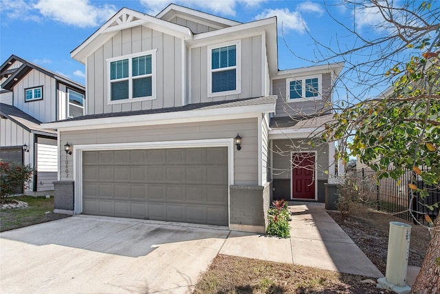 view of front of house featuring brick siding, board and batten siding, fence, concrete driveway, and an attached garage