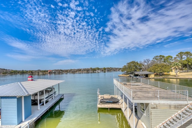 dock area with a water view