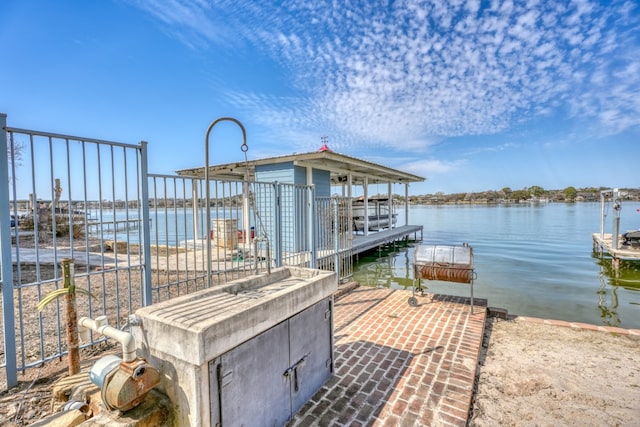 dock area featuring a water view