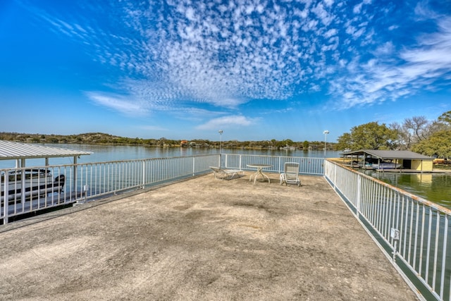 view of dock with a water view