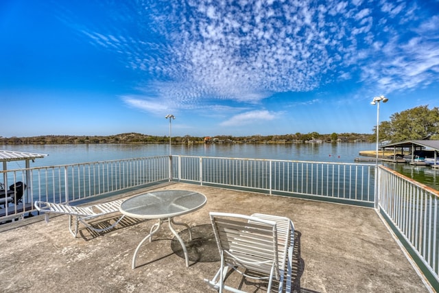 view of patio / terrace with a water view