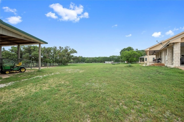 551 Gatlin Creek Rd, Dripping Springs, TX 78620 - view of green lawn featuring a ceiling fan