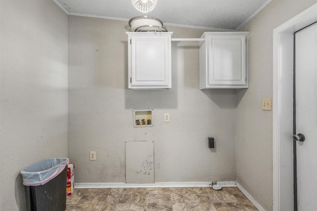 172 Hershal Ln, Cedar Creek, TX 78612 - laundry area featuring washer hookup, ornamental molding, electric dryer hookup, and a textured ceiling