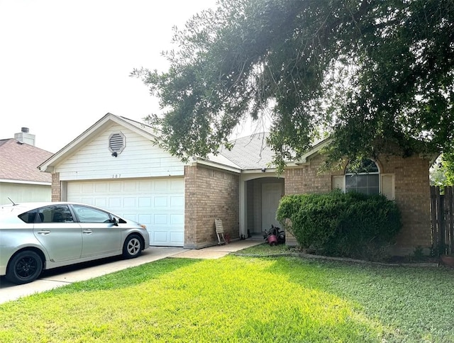 ranch-style house with driveway, brick siding, an attached garage, and a front yard