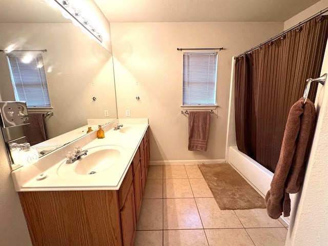 full bathroom featuring a sink, double vanity, shower / bath combo, and tile patterned floors