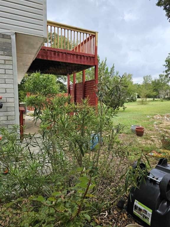 view of yard featuring a wooden deck