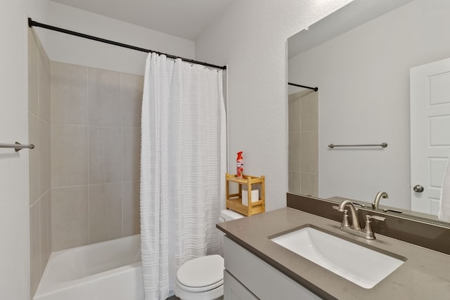 full bathroom featuring vanity, shower / bath combination with curtain, and toilet