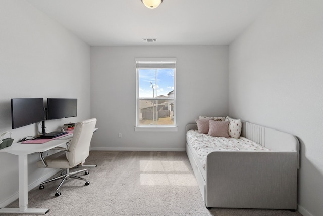 interior space featuring carpet flooring, visible vents, and baseboards