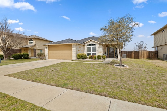 view of front facade featuring stone siding, concrete driveway, a front yard, and fence