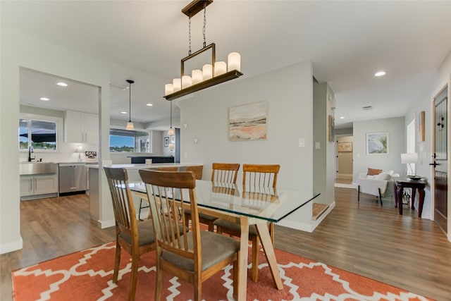 dining room with recessed lighting, baseboards, and dark wood-style flooring