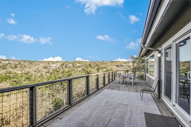 balcony featuring outdoor dining area