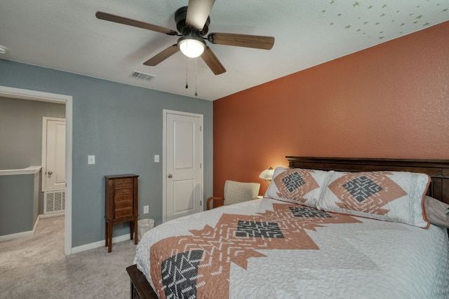220 Wonderful Life Way, Jarrell, TX 76537 - bedroom with light carpet and a ceiling fan