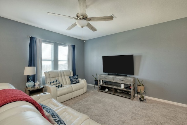 220 Wonderful Life Way, Jarrell, TX 76537 - carpeted living room with a ceiling fan and baseboards