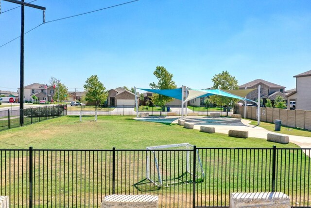 220 Wonderful Life Way, Jarrell, TX 76537 - view of yard featuring a residential view
