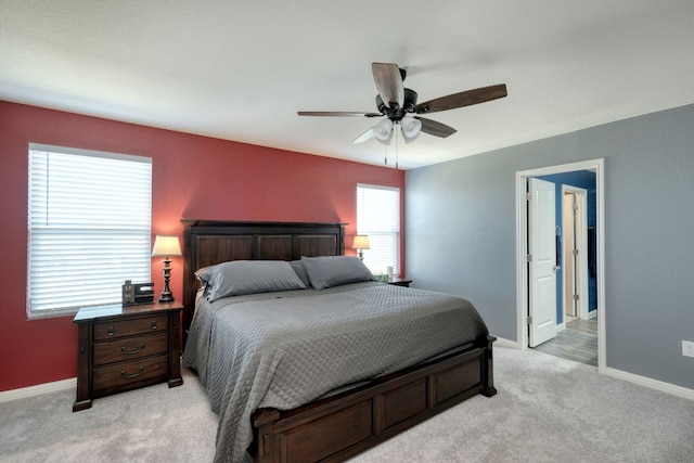 220 Wonderful Life Way, Jarrell, TX 76537 - bedroom with light colored carpet and a ceiling fan