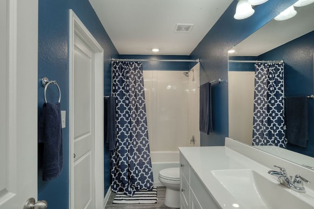 220 Wonderful Life Way, Jarrell, TX 76537 - bathroom with vanity, shower / tub combo with curtain, and wood finished floors