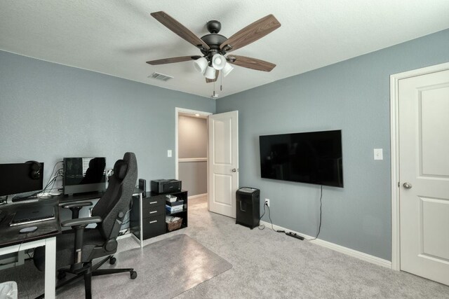 220 Wonderful Life Way, Jarrell, TX 76537 - carpeted home office with a ceiling fan and baseboards