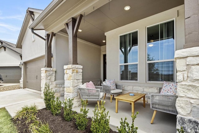 view of patio featuring an attached garage